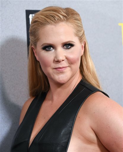 Amy Schumer attends the world premiere of "Trainwreck" in New York in this  July 14, 2015, photo. On Sept. 11,  Schumer and author Stephen King will be guests of Stephen Colbert's "The Late Show." The Associated Press