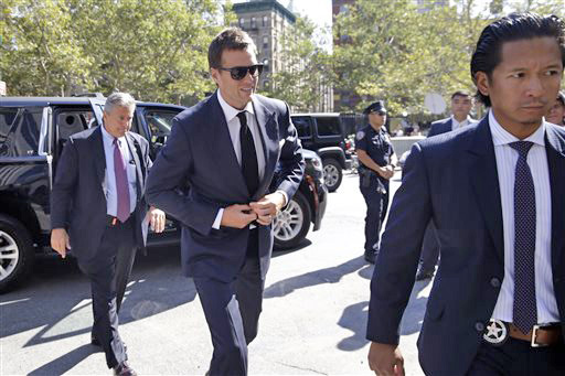 New England Patriots quarterback Tom Brady leaves federal court in New York on Aug. 31, 2015. Last-minute settlement talks between lawyers for Brady and NFL Commissioner Roger Goodell failed, leaving the decision on "Deflategate" to U.S. District Judge Richard Berman, who threw out Brady's four-game suspension. The Associated Press