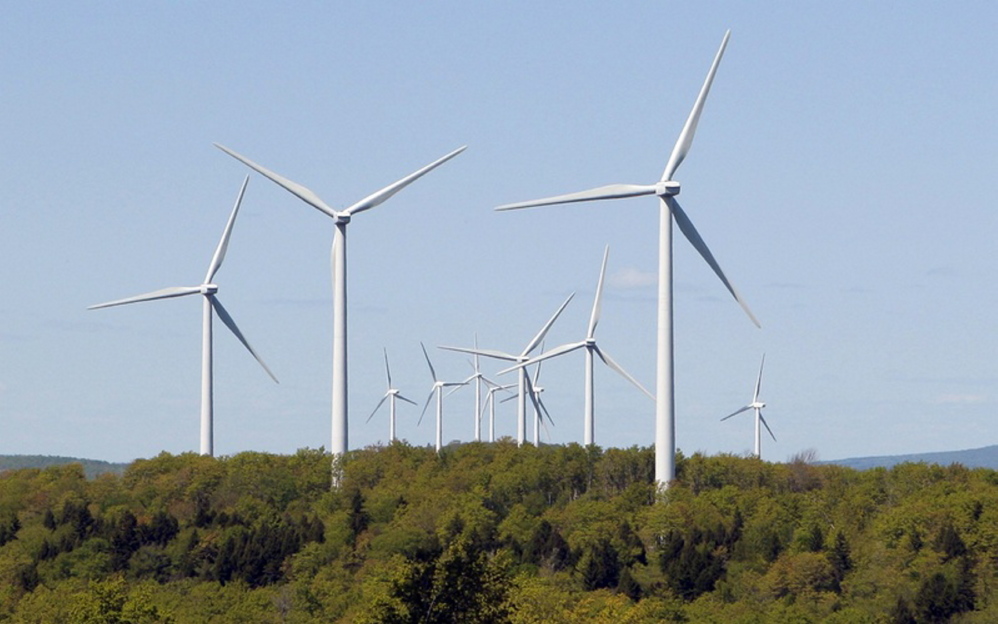 Wind turbines at SunEdison’s Stetson wind farm in Washington County near Danforth. The company has reached agreement on a $2.5 million conservation program, forged after Friends of Maine Mountains dropped opposition this year to a 56-turbine wind farm in Bingham.