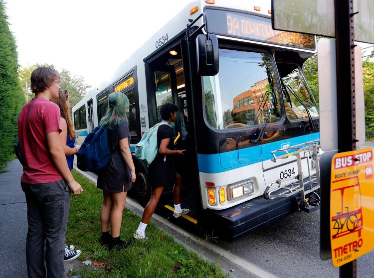 Casco Bay High School students board a Metro bus on Sept. 2, the first day of school in Portland. Metro officials are keeping an eye on which buses are filling up quickly so they can deploy extra buses where they're needed.
Derek Davis/Staff Photographer