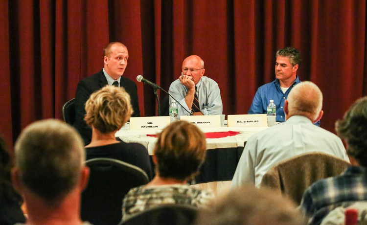 Tom MacMillan, left, Mayor Michael Brennan, center, and Ethan Strimling debate at Mechanic Hall in Portland on September. Electing a mayor gives Portland voters a direct voice in the direction of the city. 