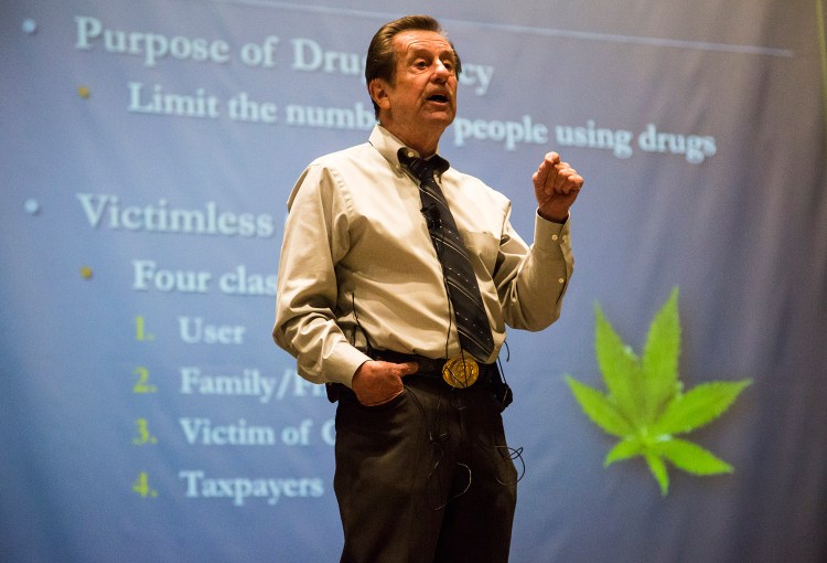 Thomas Gorman speaks Tuesday night about issues raised by legalizing recreational use of marijuana. He said one is a jump in the number of people who report trying pot.
Whitney Hayward/Staff Photographer