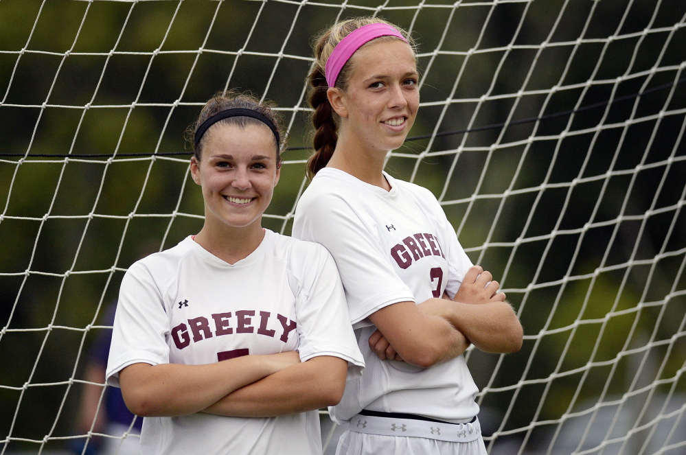Izzy Hutnak, left, and Jocelyn Mitiguy have played together so long they have a sense of where the other will be at any given time. “I’m anticipating Jocelyn’s run as soon as the ball’s coming to me, before it gets to my feet,” Hutnak said. The duo combined for 27 goals last season.
