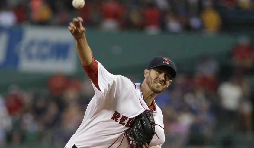 Red Sox starter Rick Porcello delivers against the New York Yankees in the first inning Tuesday night. Porcello took a hard-luck loss as Boston scored just one run.