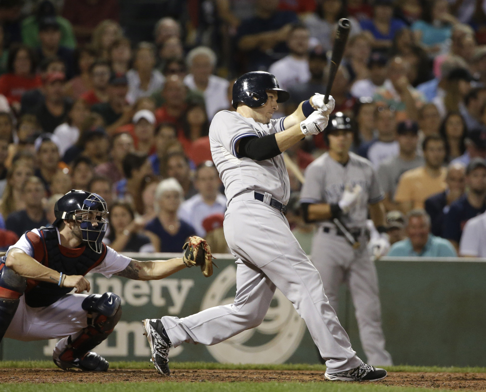 The Yankees’ Stephen Drew hits a two-run double in the fifth inning. His hit turned out to be the game winner.