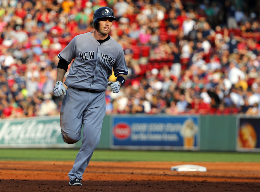 The Yankees’ Stephen Drew rounds the bases after hitting a three-run home run in the third inning. The Yankees jumped out to a big lead early to put the game out of reach.