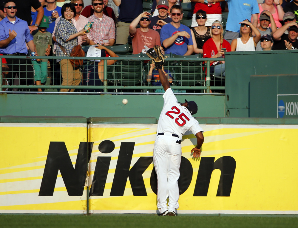 Red Sox right fielder Jackie Bradley Jr. goes up against the wall but can’t get to a home run hit by the Yankees’ Didi Gregorius in the fifth inning Wednesday at Fenway Park.