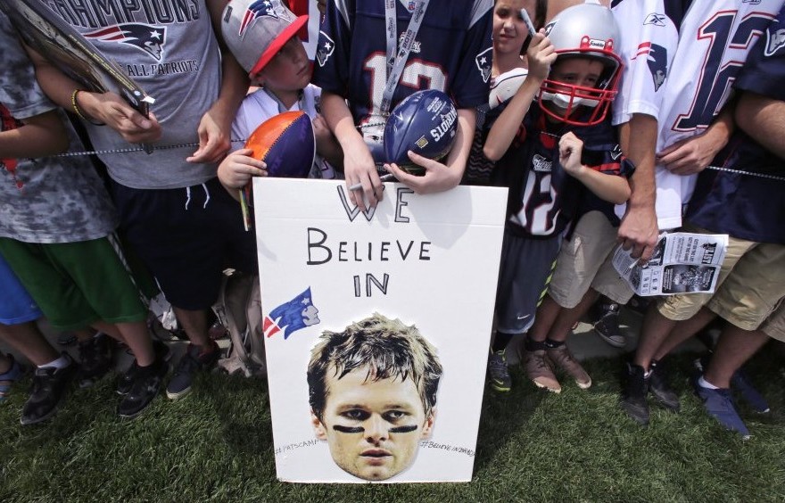 New England Patriots fans show their support for New England quarterback Tom Brady.