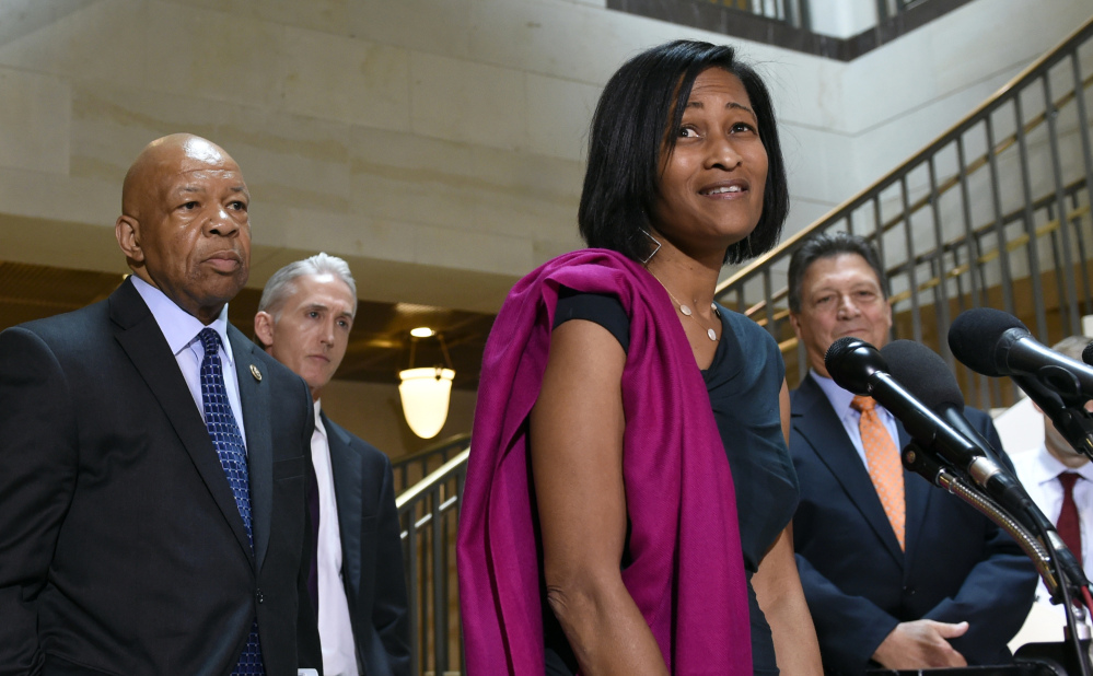 Former Clinton aide Cheryl Mills speaks to reporters on Capitol Hill in Washington on Thursday following her deposition before the panel investigating Benghazi.