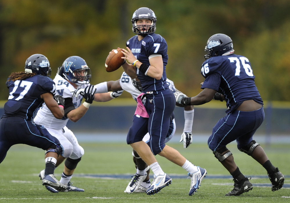 Maine quarterback Dan Collins steps up in the pocket to throw late in the fourth quarter of a 41-20 loss to Villanova at Alfond Stadium in Orono on Oct. 4, 2014.