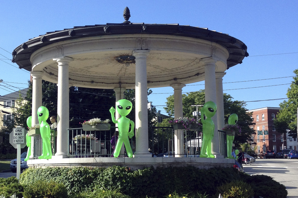 Inflatable toy aliens adorn a gazebo in Exeter, N.H., during the Exeter UFO Festival in 2014. Hundreds of people are expected at this weekend’s event that runs through Sunday.