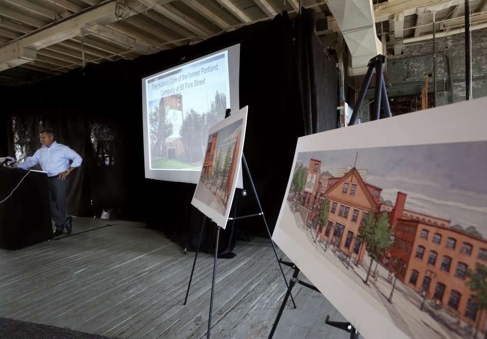 Jim Brady, an owner of the former Portland Co. complex, unveils plans for historic preservation in the development of the site. Derek Davis/Staff Photographer