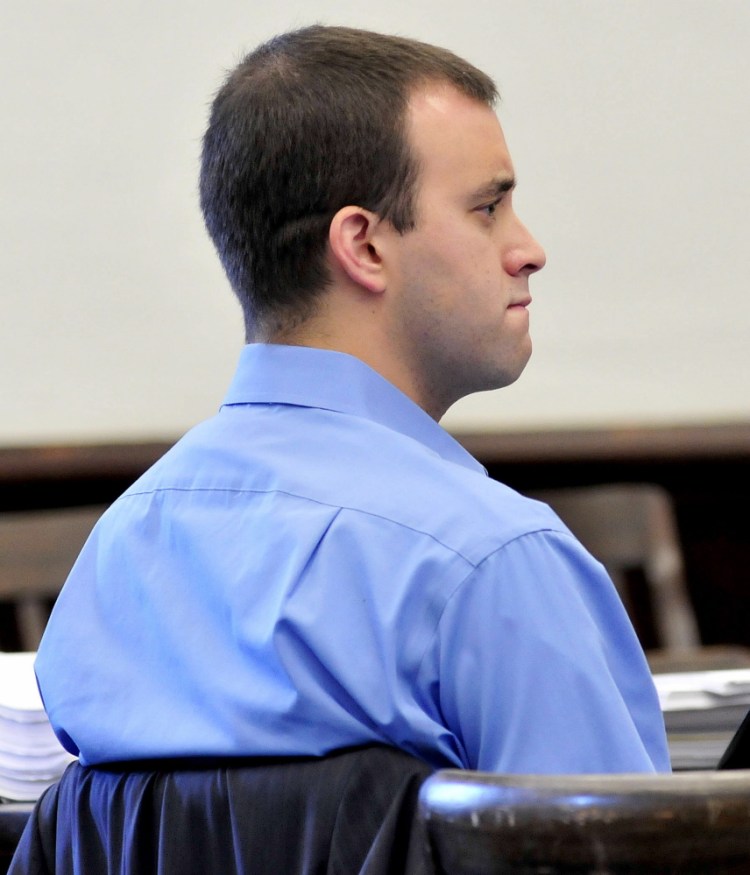Andrew Maderios listens as audio recordings of an attack on his former girlfriend are played to jurors during closing statements Friday in Somerset County Superior Court in Skowhegan.
