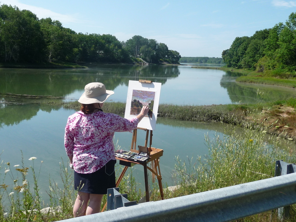 Artist Kay Sullivan creates “Summer Day” during the recent Wet Paint on the Weskeag! benefit auction.