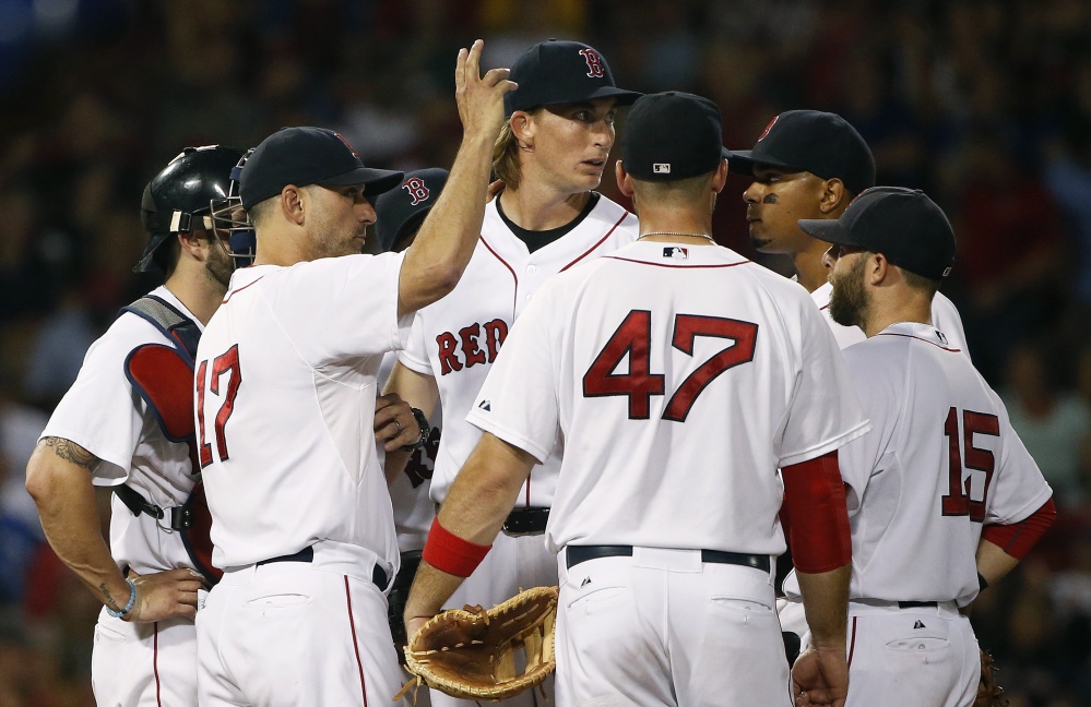 Red Sox interim manager Torey Lovullo calls for a new pitcher to relieve Henry Owens in the sixth inning Tuesday night. Owens held the Blue Jays to one run and three hits.