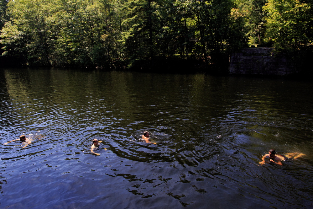 Students who found themselves with an afternoon off spend it in the Saco River in Buxton on Wednesday. SAD 60 Superintendent Steven Connolly said he did “not wish to create hardships on families, but I think this (early release) is the right thing to do.”