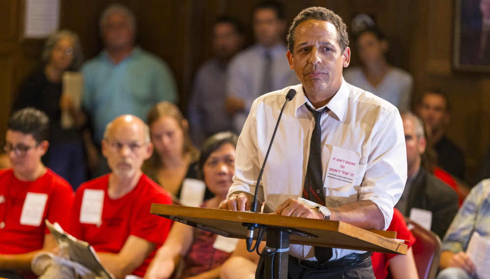 Michael Araujo, an organizer for Restaurant Opportunities Center United, makes his case Wednesday night for the Portland City Council to approve an increase in the city's minimum wage for workers who earn tips.
Ben McCanna/Staff Photographer