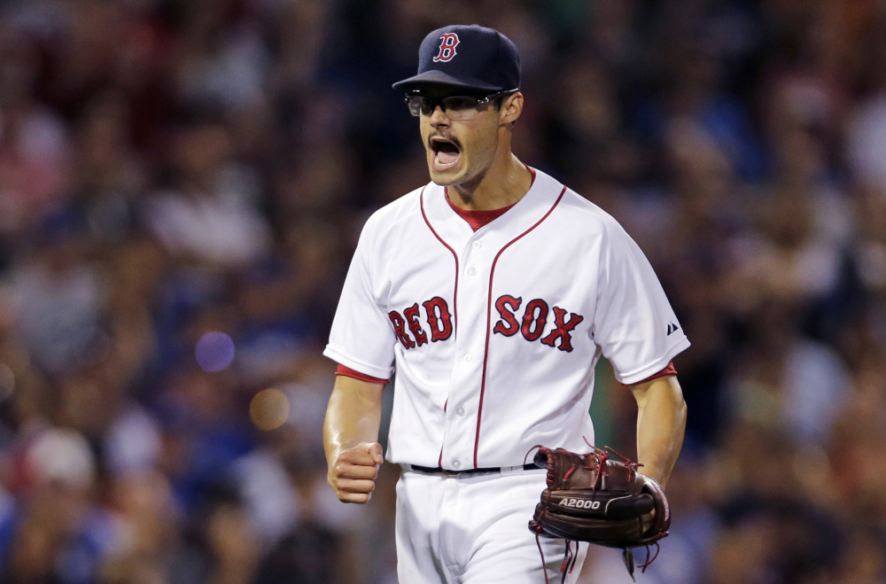 Red Sox starter Joe Kelly yells after striking out Toronto’s Russ Martin with the bases loaded to end the top of the fourth inning Wednesday night. Kelly got his eighth straight win.