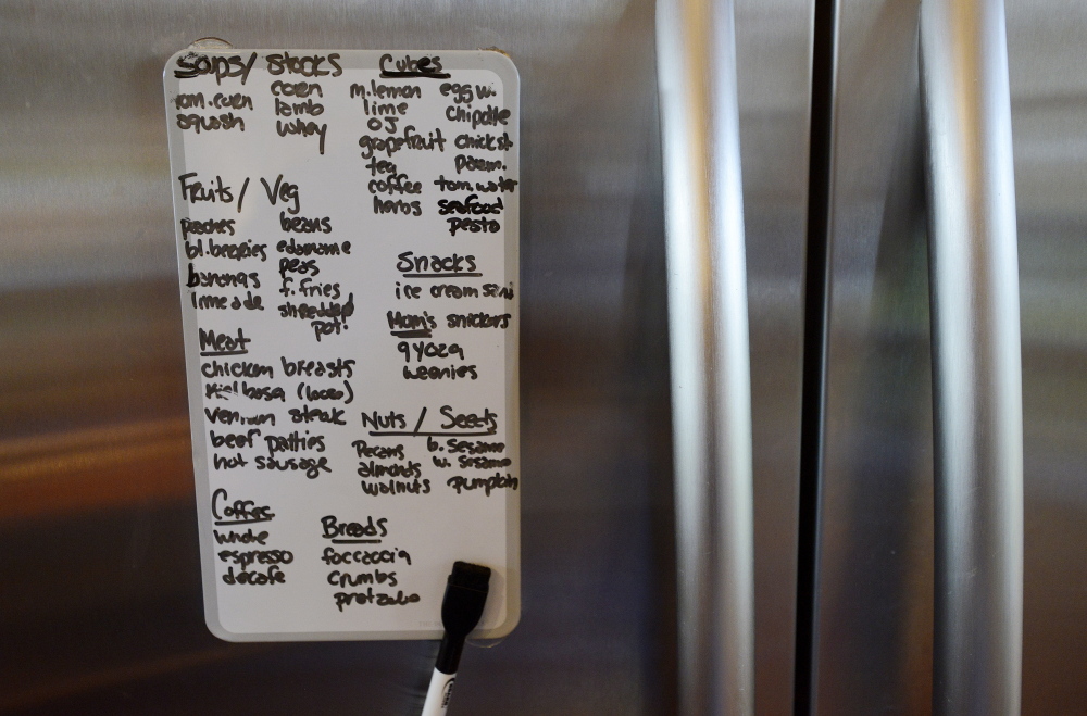 An inventory list on the refrigerator at Christine Burns Rudalevige’s home.