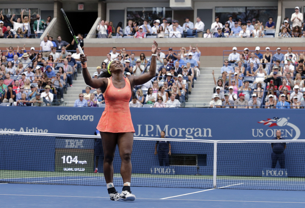 Serena Williams reacts after a shot to Roberta Vinci of Italy during a semifinal match at the U.S. Open tennis tournament Friday in New York.