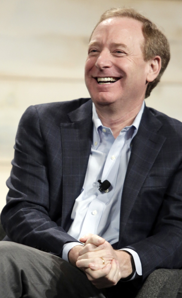 Microsoft’s Brad Smith takes questions at the annual shareholders’ meeting in Washington state in 2014.