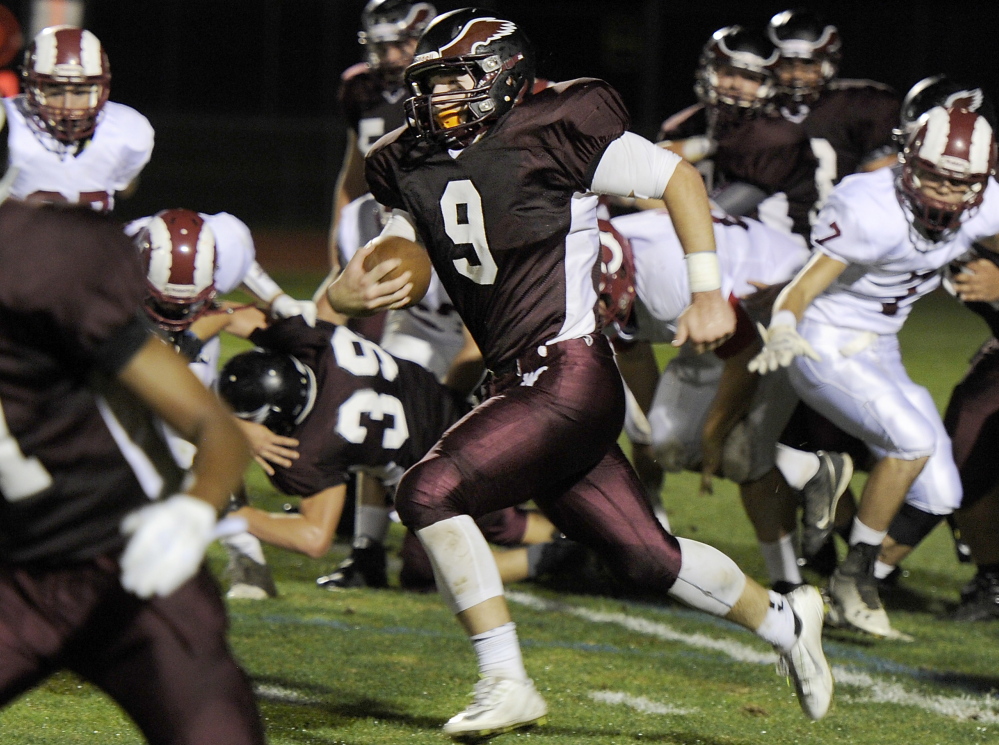 Kyle Houser of Windham finds lots of running room Friday during the Eagles’ 42-0 win over Bangor. Houser rushed for 186 yards and two touchdowns.