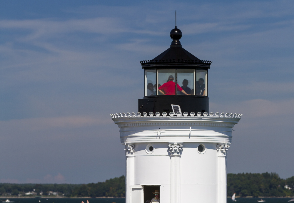 Visitors gather at the top of Bug Light in South Portland as it was opened to the public for free.