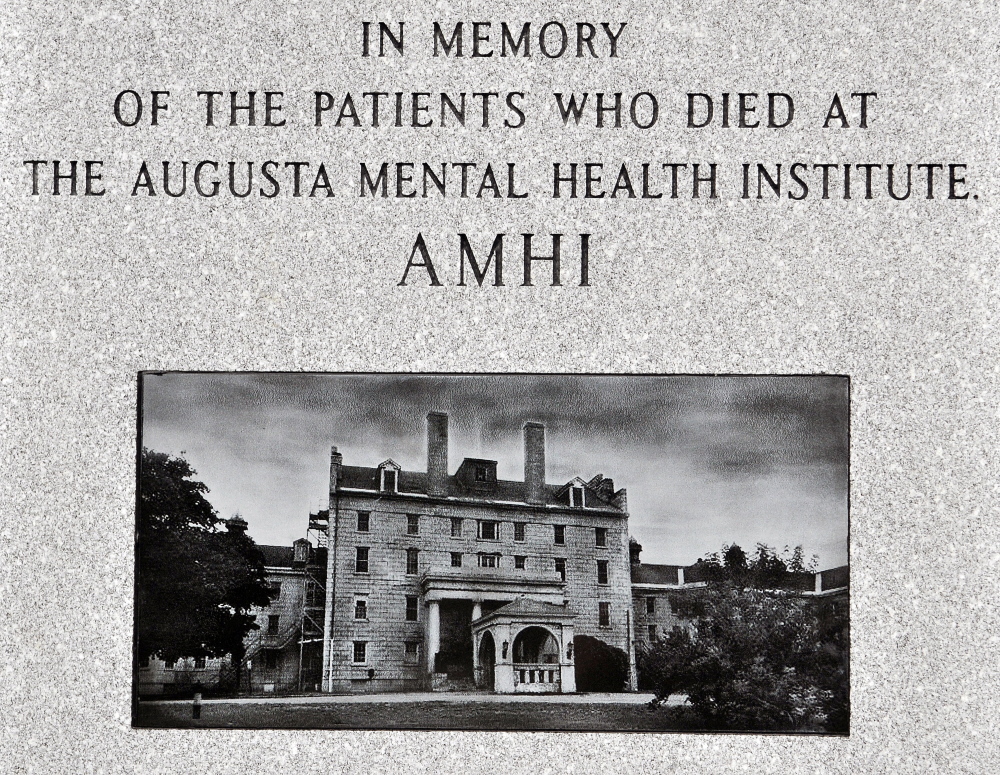 A close-up of the monument that honors the people who died at the Augusta Mental Health Institute.