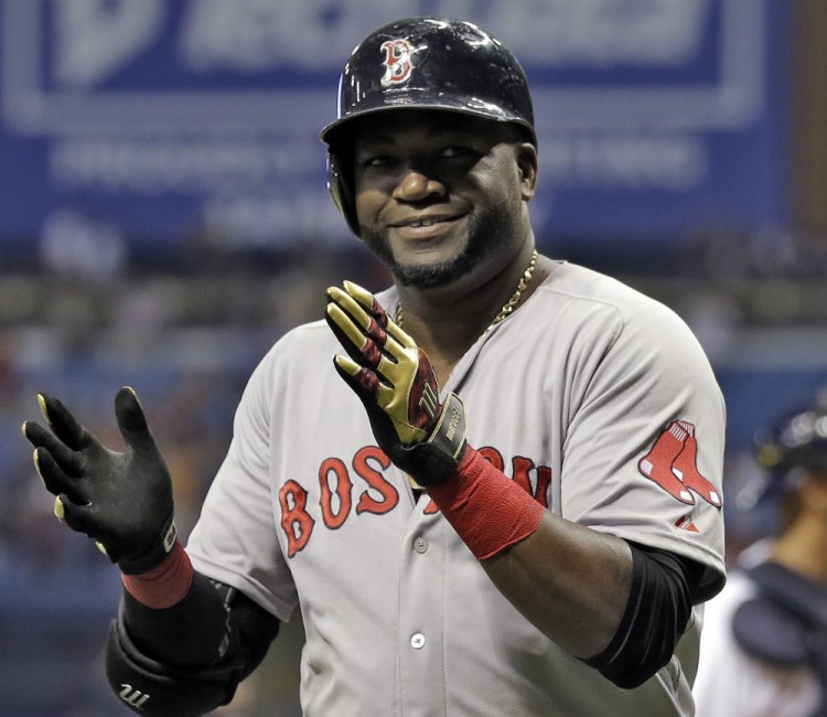 David Ortiz applauds after hitting his 500th career home run during the fifth inning on Saturday in St. Petersburg, Fla.