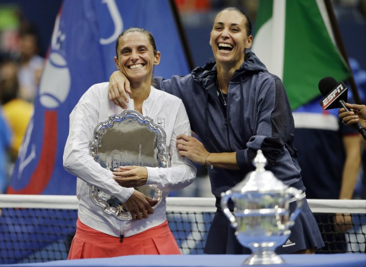 Roberta Vinci, left, and Flavia Pennetta both had plenty of reason to smile Saturday after the U.S. Open final. Vinci upset Serena Williams on Friday to reach the final, and Pennetta won the title, then announced her retirement.