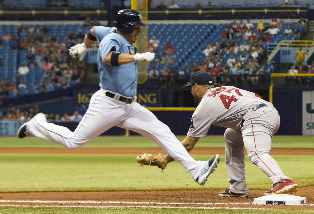 Red Sox first baseman Travis Shaw makes a force-out against Tampa Bay Rays shortstop Asdrubal Cabrera in the ninth inning Sunday in St. Petersburg, Fla.
The Associated Press