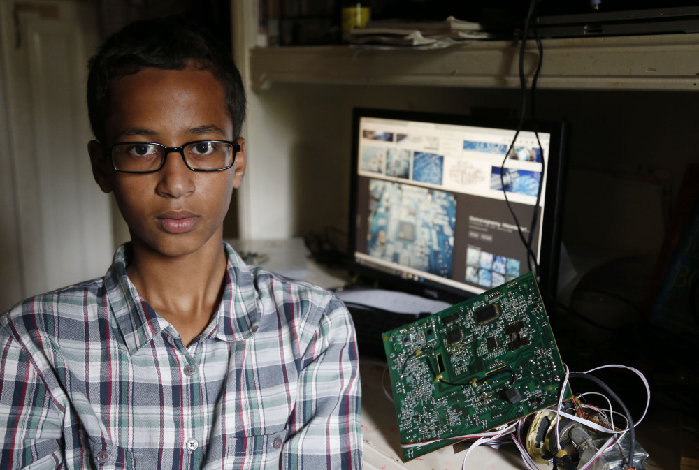 High school student Ahmed Muhamed, 14, poses for a photo at his home in Irving, Texas, on Tuesday. Muhamed was arrested and interrogated by Irving police officers Monday after bringing a homemade clock to school. Police said the device could be mistaken for a fake explosive.