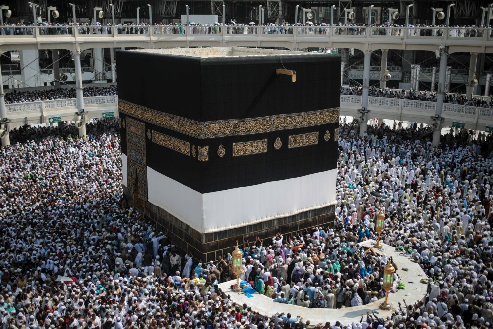 Muslim pilgrims circle the Kaaba, the cubic building at the Grand Mosque in the Muslim holy city of Mecca, Saudi Arabia, on Tuesday. Almost 1 million pilgrims had arrived by Tuesday ahead of the hajj.