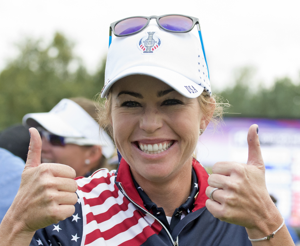 Paula Creamer of United States celebrates in the singles on Day 3 at the Solheim Cup golf tournament in St. Leon-Rot, southern Germany, on Sunday. Creamer defeated Gal to complete a remarkable comeback as the United States won the Solheim Cup on Sunday. Creamer made five birdies in 15 holes to win the final singles match 4 and 3 and give the U.S. its first title since 2009.