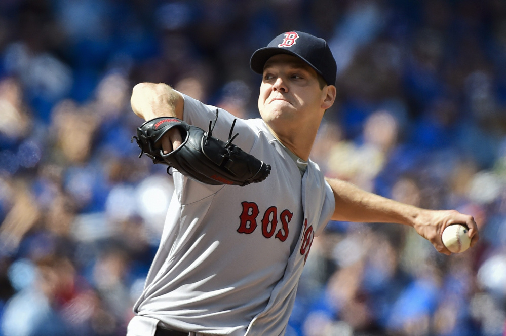 Red Sox starting pitcher Rich Hill struck out 10 batters in Boston’s 4-3 win over Toronto on Sunday to earn his first win since July 14, 2013.