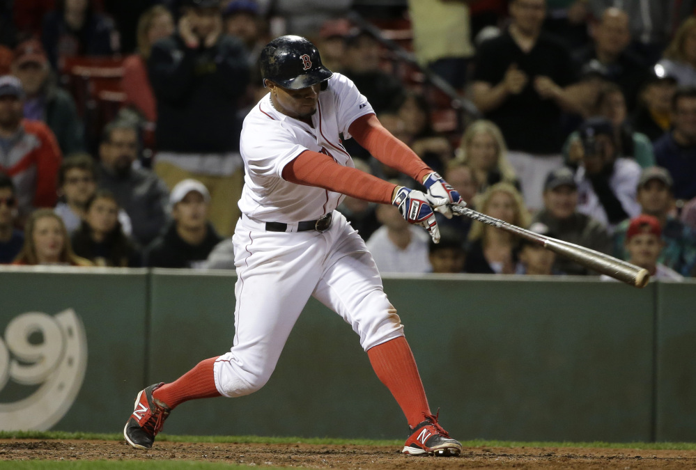 Red Sox shortstop Xander Bogaerts hits a grand slam in the eighth inning against the Tampa Bay Rays, a shot that was enough to give Boston the win.
