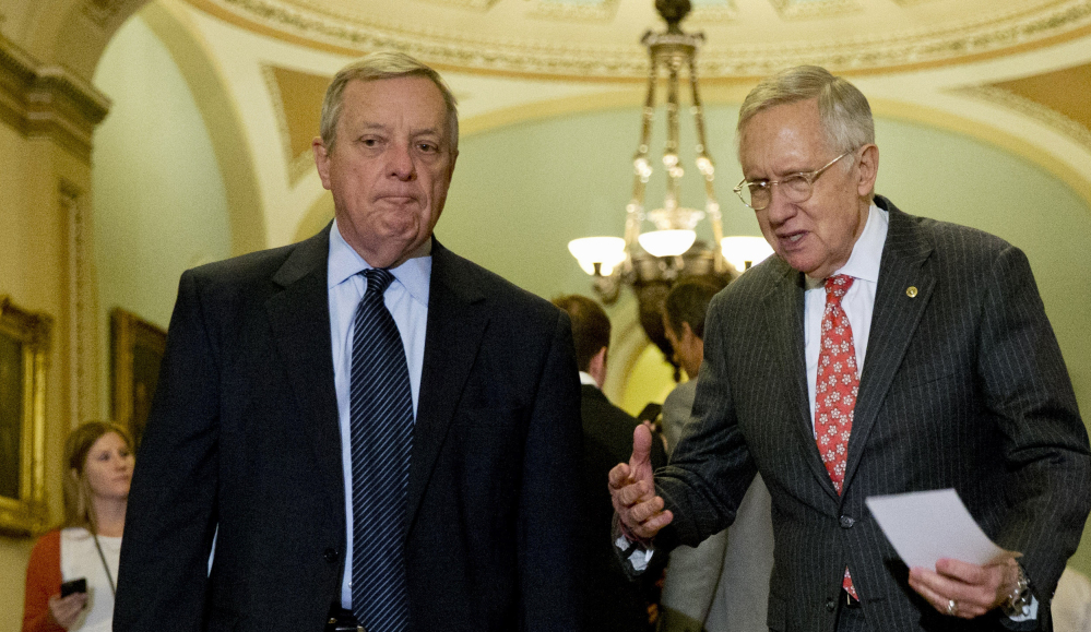 Senate Minority Leader Harry Reid, right, and Senate Minority Whip Richard Durbin arrive for a news conference on Capitol Hill on Tuesday. Earlier in the day, Democrats voted down a GOP bill to ban late-term abortions.