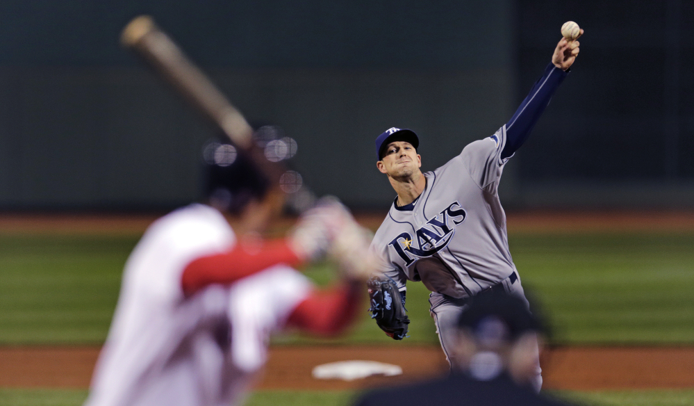 Tampa Bay Rays starting pitcher Drew Smyly delivers in the first inning on his way to a win over the Red Sox. Smyly held the Red Sox to five hits and no runs, pitching into the seventh inning.