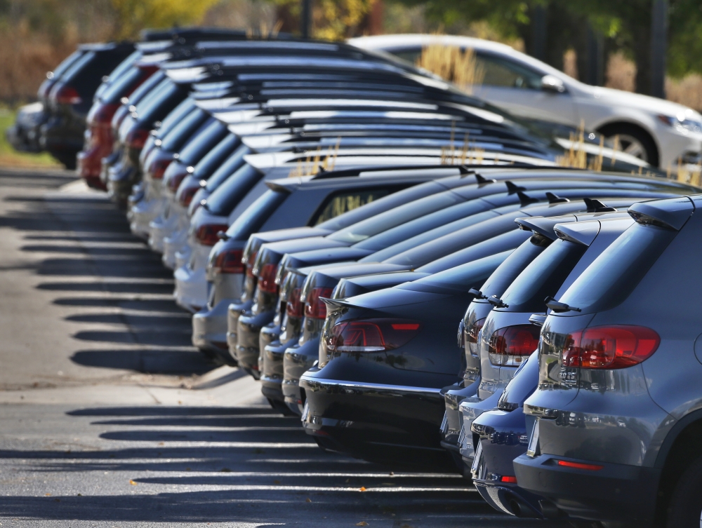 Volkswagen cars are displayed for sale on the lot of a VW dealership in Boulder, Colo., on Thursday. Volkswagen is reeling days after it became public that the German company had rigged diesel emissions software to pass U.S. tests.