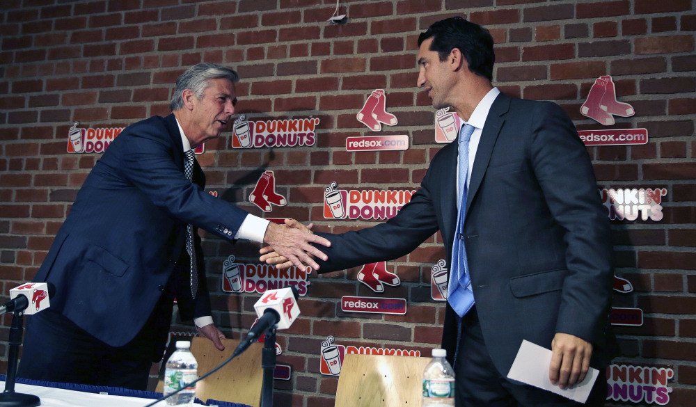 Mike Hazen, right, is the new general manager and senior vice president for the Boston Red Sox. The appointment is the first big move by Dave Dombrowski, left, since he took over as president of baseball operations for the team in August. The Associated Press