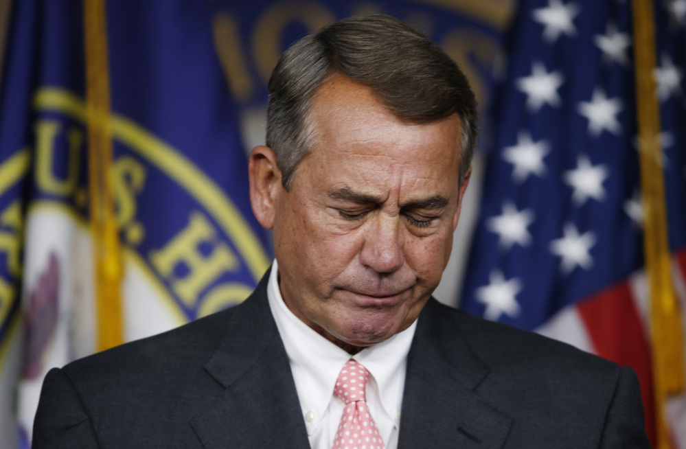 House Speaker John Boehner of Ohio pauses during a news conference on Capitol Hill in Washington on Friday, when he announced that he would resign from Congress at the end of October.