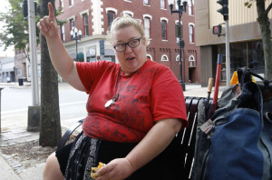 LEWISTON, ME - SEPTEMBER 25: Lewiston Mayor Robert Macdonald is calling for the state to publicize its list for welfare recipients. Siiri Cressey, 38, of Lewiston, eats lunch on a park bench in Lewiston on Friday. Cressey, who receives asssistance for housing and disability, as well as food stamps, voices her opinion on the Mayor's plan. (Photo by Derek Davis/Staff Photographer)