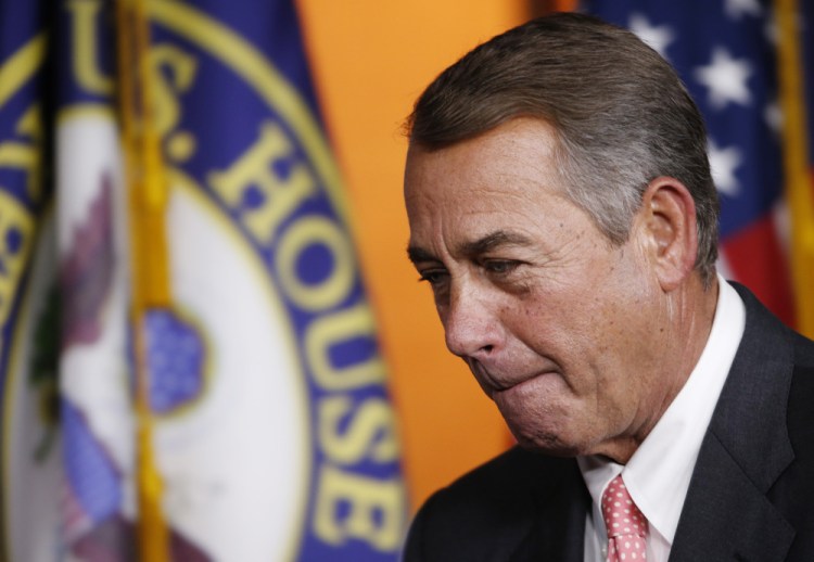 An emotional House Speaker John Boehner leaves Friday’s news conference after announcing his resignation. Boehner’s resignation denies his opponents their best leverage for retribution for a government funding package that includes Planned Parenthood.