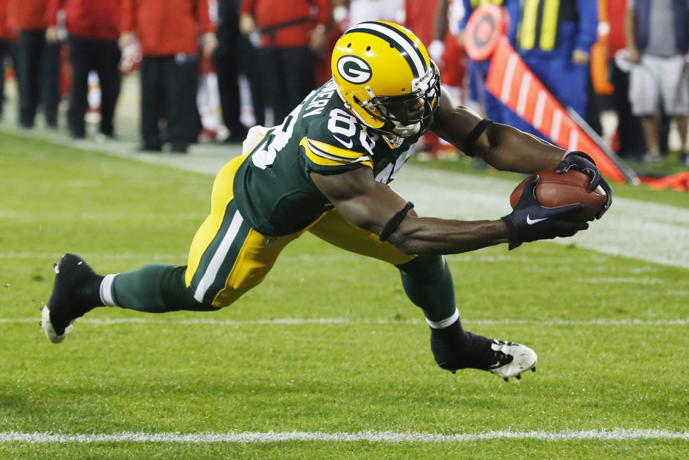 Ty Montgomery of the Green Bay Packers catches a touchdown in the first half Monday night against the Kansas City Chiefs in Green Bay, Wisconsin. The Packers won, 38-28.