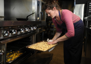 Kim Rogers, a chef at Hugo’s Restaurant in Portland, roasts hazelnuts for use in a special recipe. Gordon Chibroski/Staff Photographer