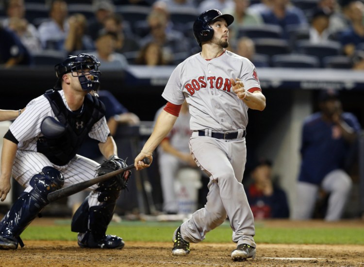 Red Sox catcher Blake Swihart hits a two-run home run in the eighth inning Tuesday night as Boston puts the game out of reach.