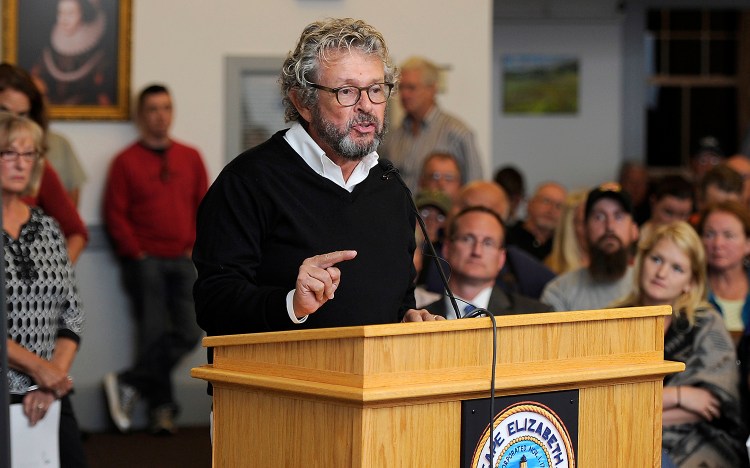 William Morris, who owns a house on Cross Steet in the abutting neighborhood that is inhabited by his daughter, son-in-law and grandson discusses the dangers of the Spurwink Rod &Gun Club's firing range at the Cape Elizabeth Town council meeting. Gordon Chibroski/Staff Photographer