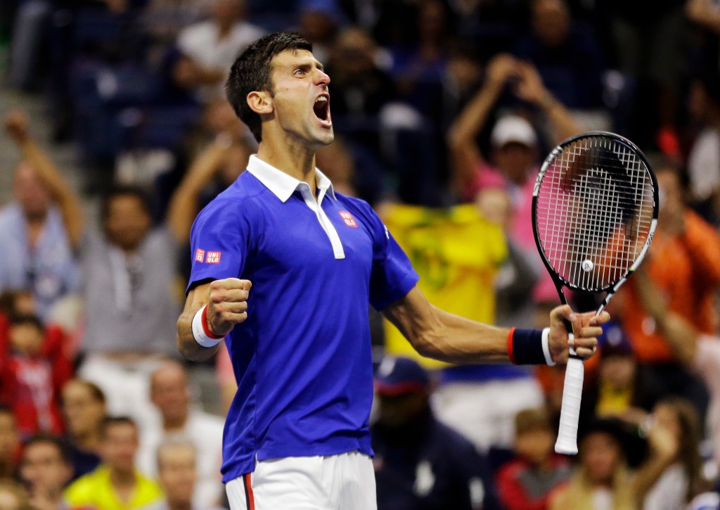 Novak Djokovic celebrates after a service break in the fourth set of the U.S. Open final Sunday against Roger Federer. Djokovic won 6-4, 5-7, 6-4, 6-4.
The Associated Press
