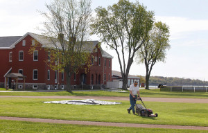 SOUTH PORTLAND, ME - MAY 20: Dave Dwinal, of the Southern Maine Community College grounds crew, mows the infield of the baseball diamond Wednesday, May 20, 2015 in South Portland, Maine. (Photo by Joel Page/Staff Photographer)
