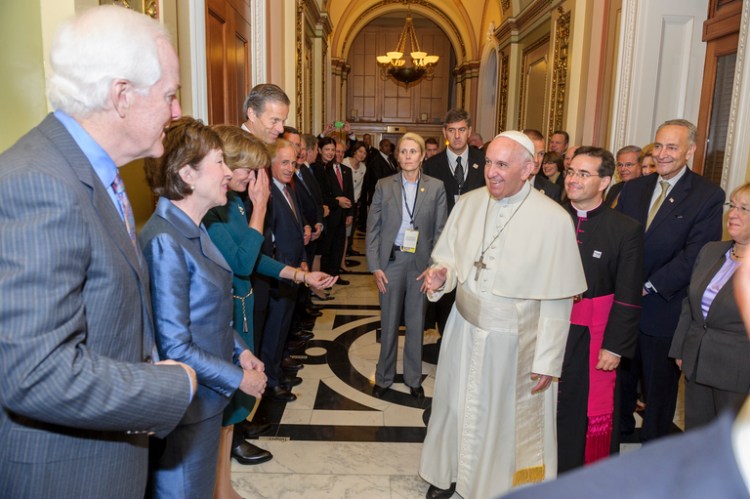 U.S. Sen. Susan Collins, R-Maine, greets Pope Francis as part of a bipartisan committee that ushered the pontiff to address a joint session of Congress on Thursday.